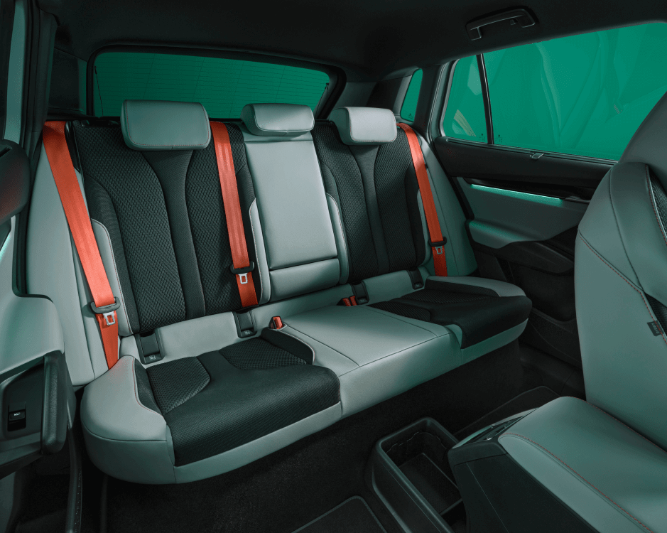 a close up of the car's rear seats, unoccupied